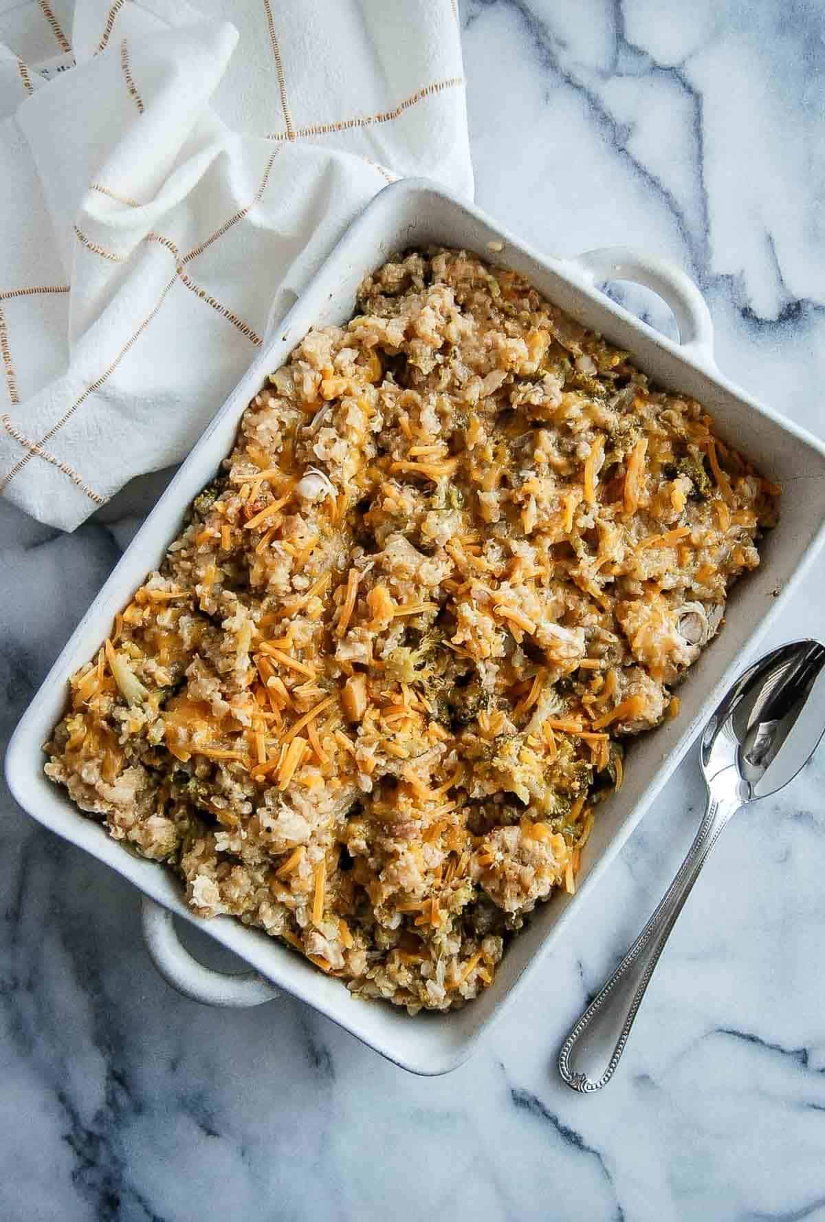 cheesy chicken broccoli and rice casserole in serving dish.