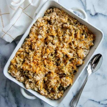 cheesy chicken broccoli and rice casserole in serving dish.