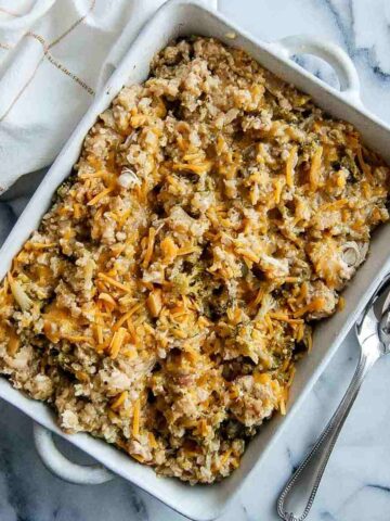 cheesy chicken broccoli and rice casserole in serving dish.