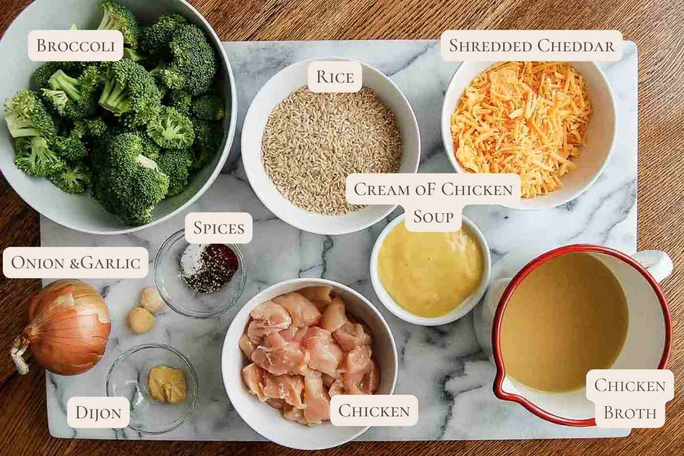 ingredients for crockpot chicken, broccoli and rice casserole with cheddar cheese on countertop.