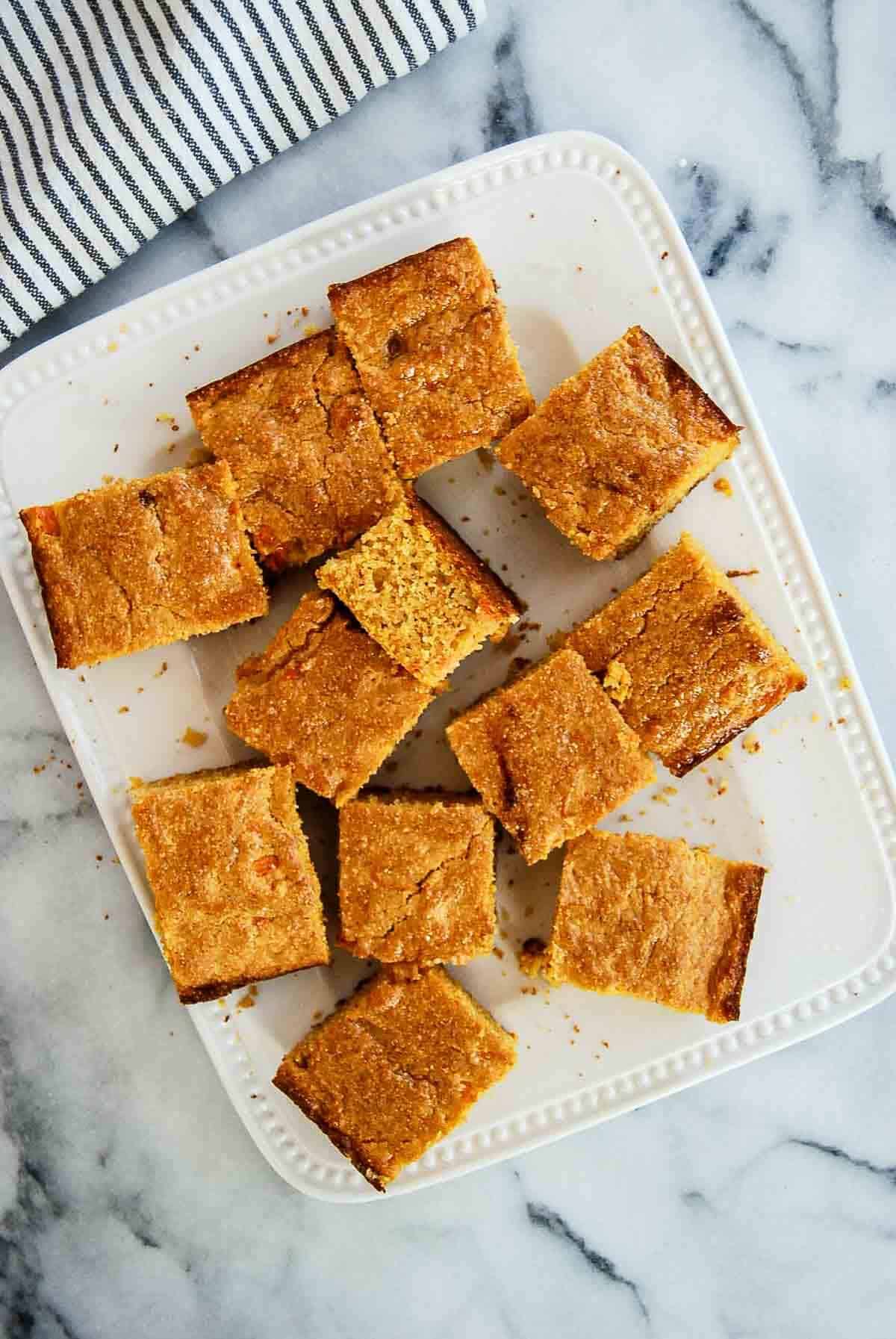 cut squares of sweet potato cornbread on serving platter.