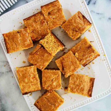 cut squares of sweet potato cornbread on serving platter.