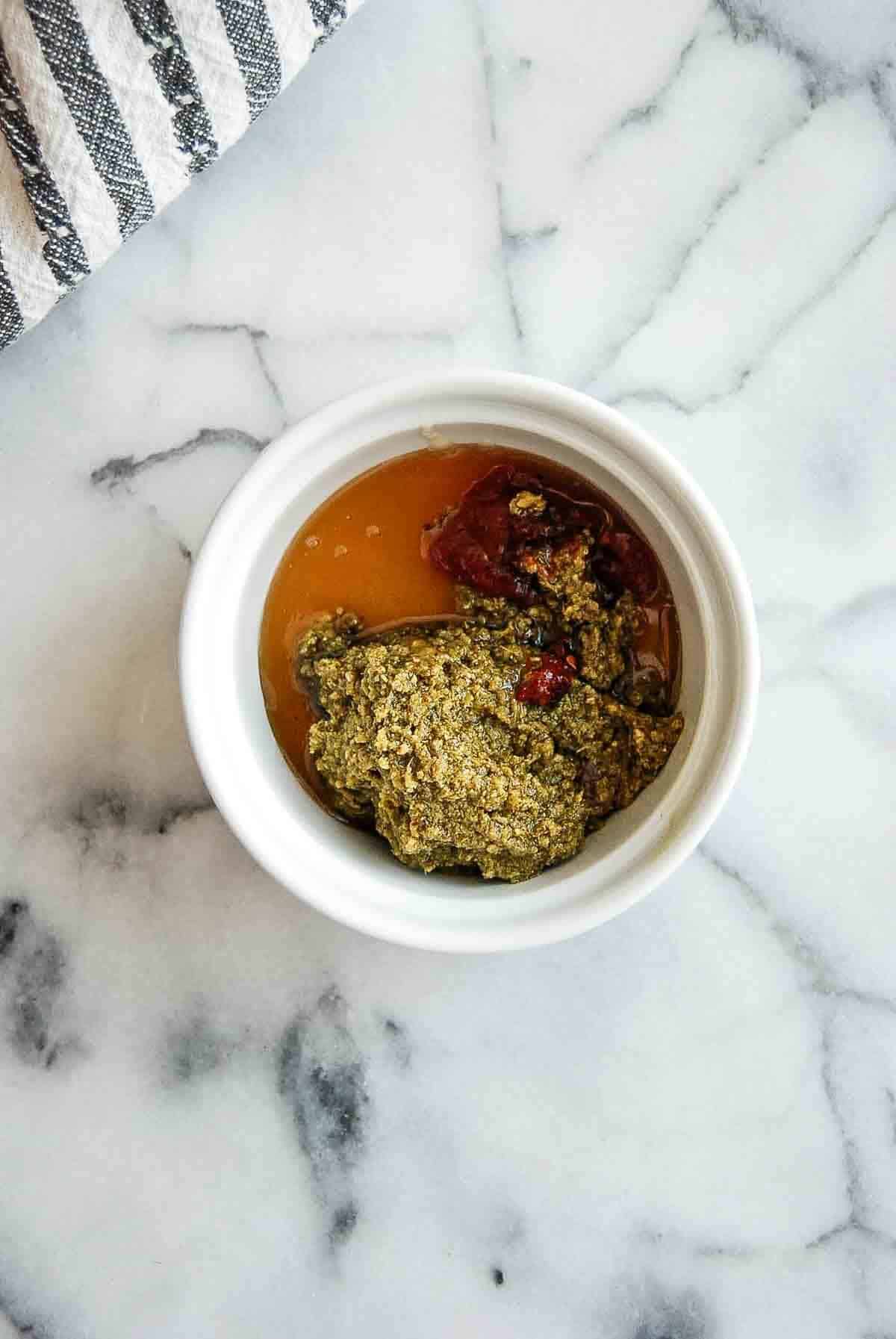 ingredients for spicy pesto in bowl.