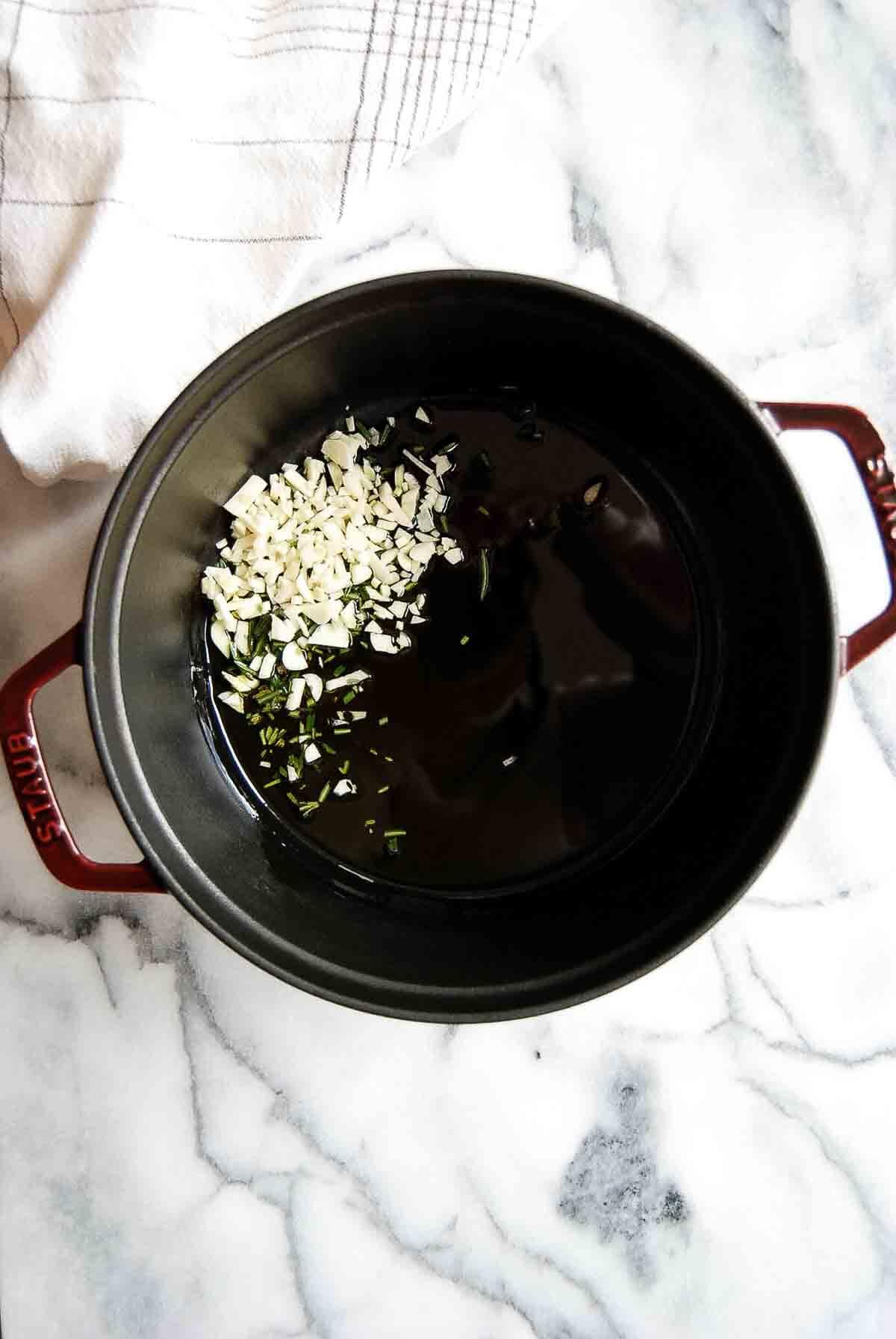 garlic and oil in dutch oven.