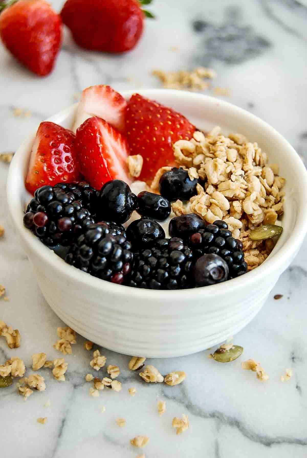 side view of cottage cheese with fruit bowl.