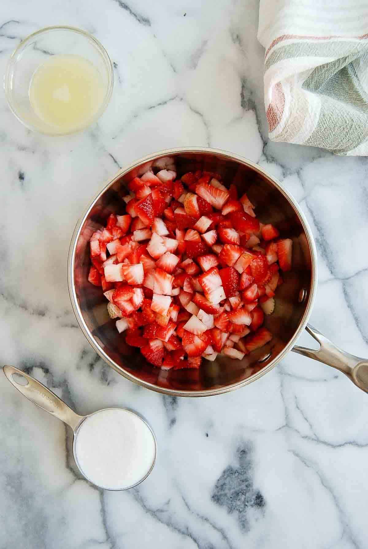 diced strawberries in saucepan.