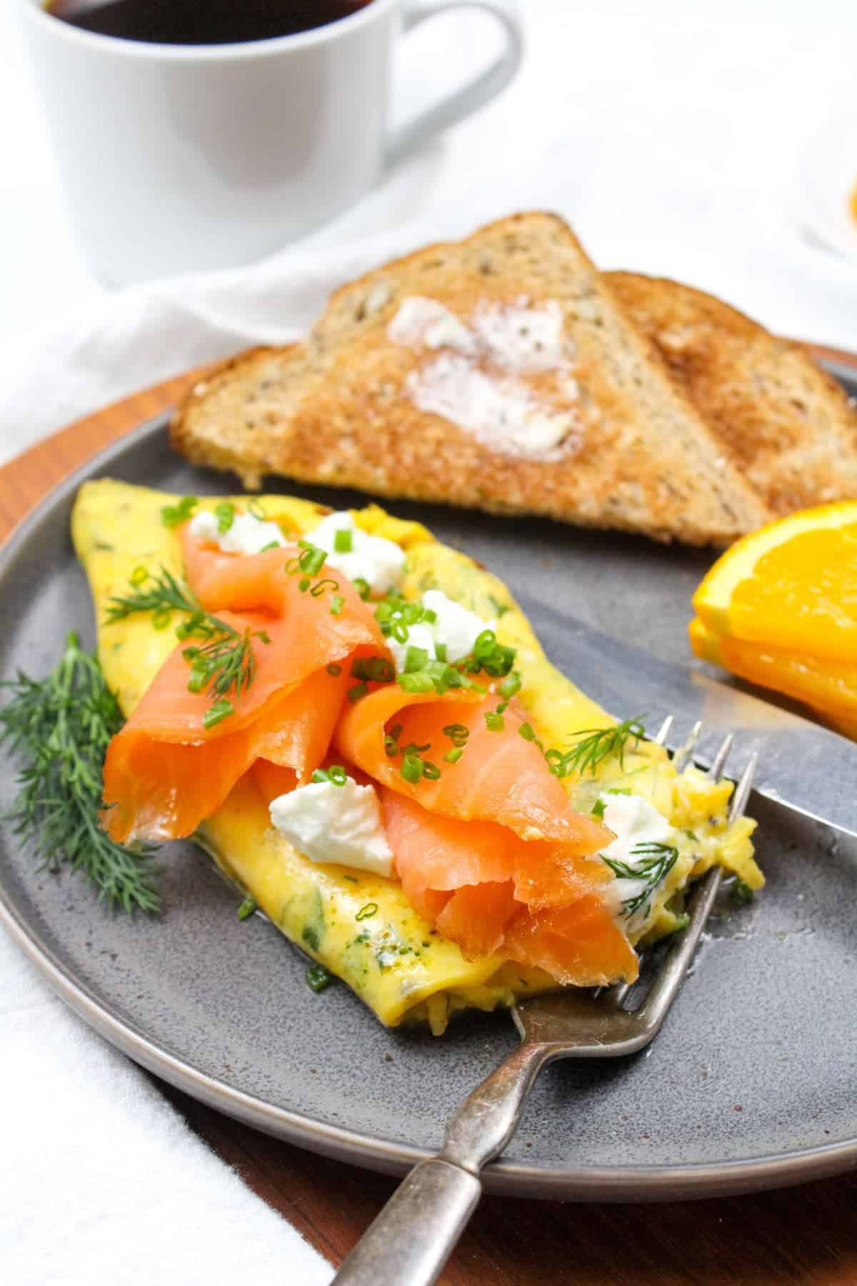 smoked salmon omelette on plate.