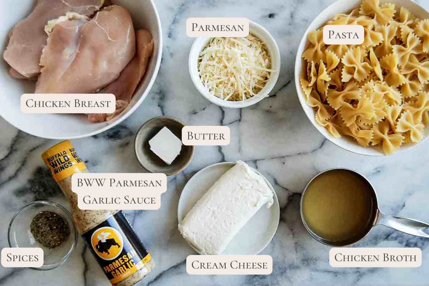 ingredients for buffalo wild wings garlic parmesan chicken pasta on countertop.