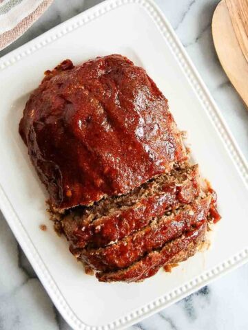 glazed meatloaf on platter.