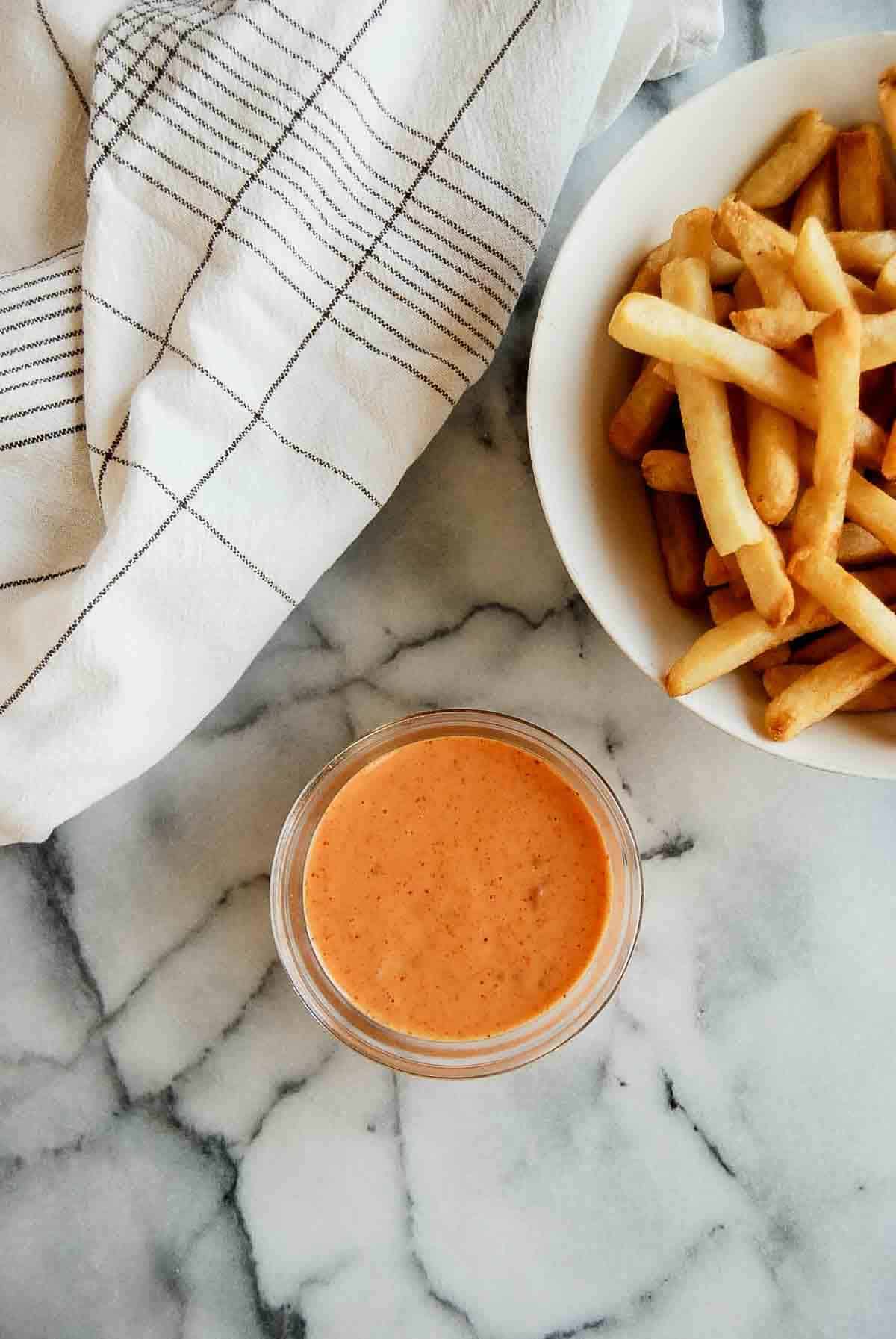 boom boom sauce with bowl of fries on the side.