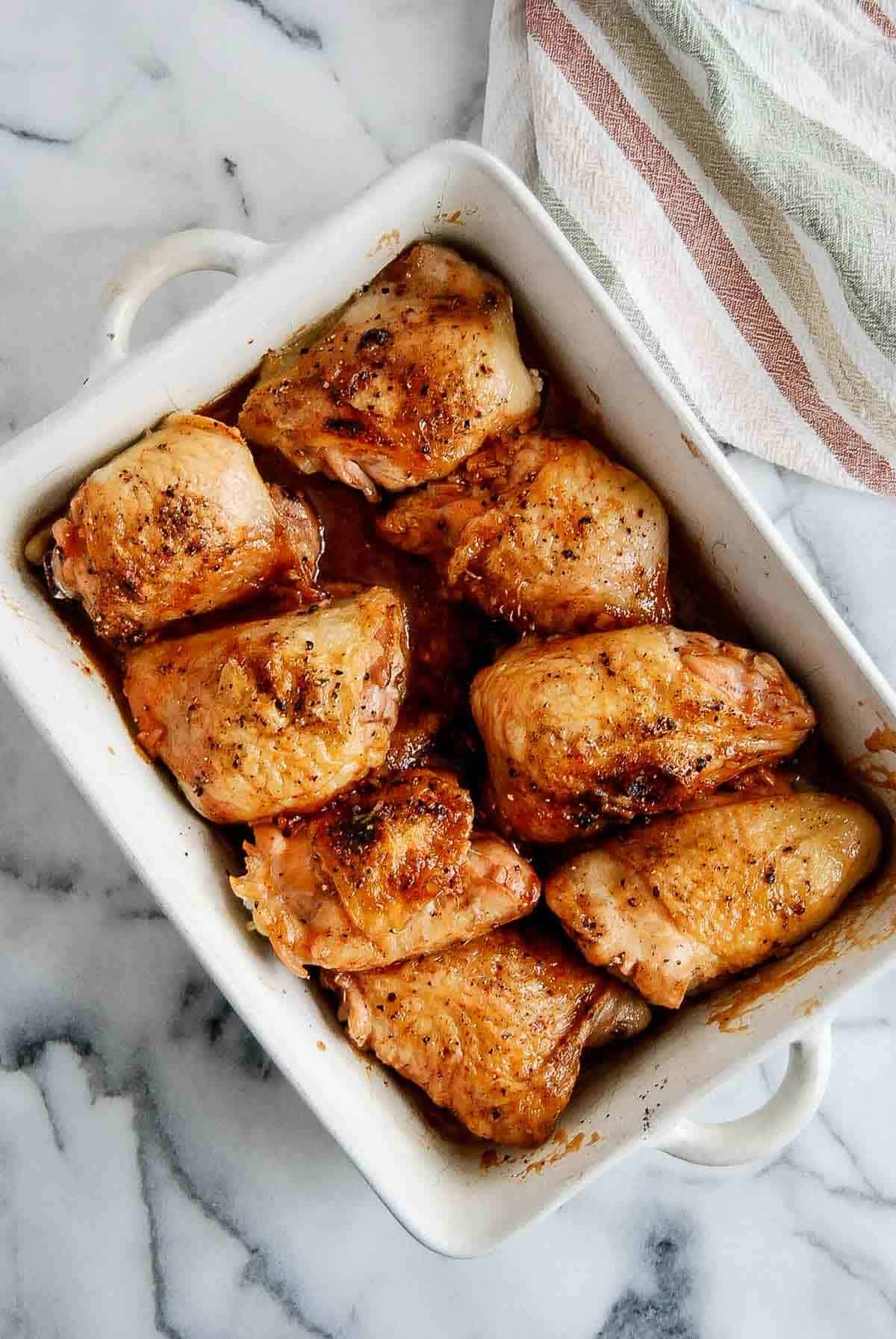 baked chicken thighs with honey sriracha sauce.