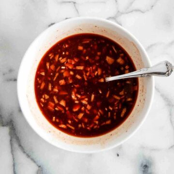 honey sriracha sauce in bowl on countertop.