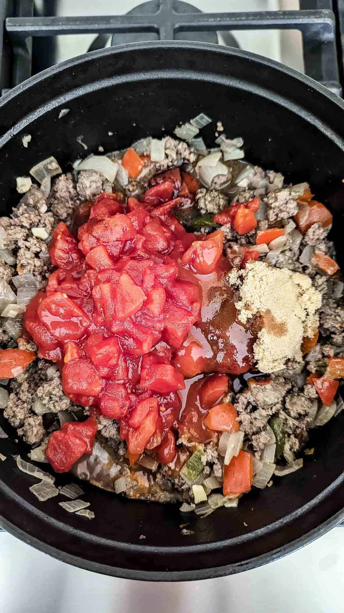 sloppy joe mixture with tomatoes, hot sauce, tomato paste and brown sugar mixed in.