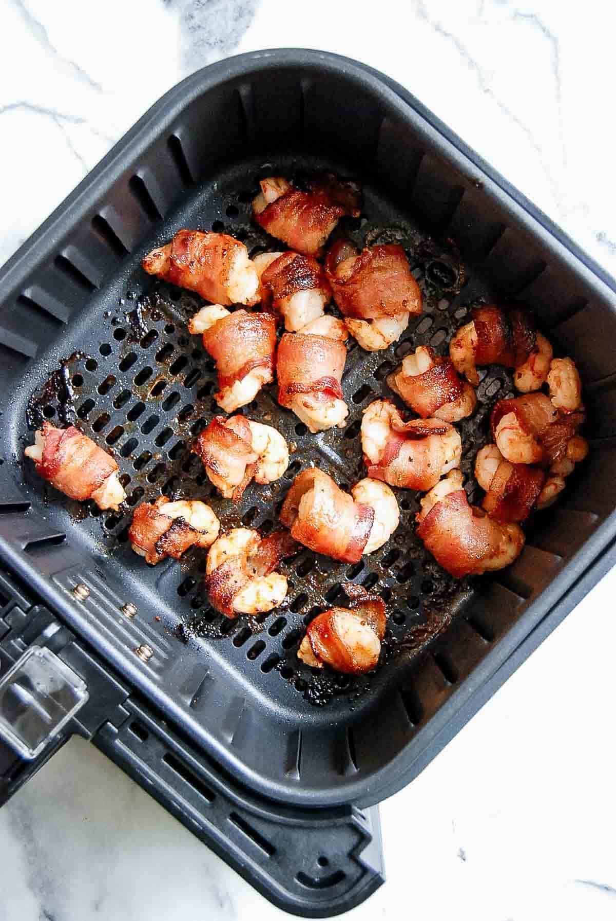 air fried bacon wrapped shrimp in the air fryer.