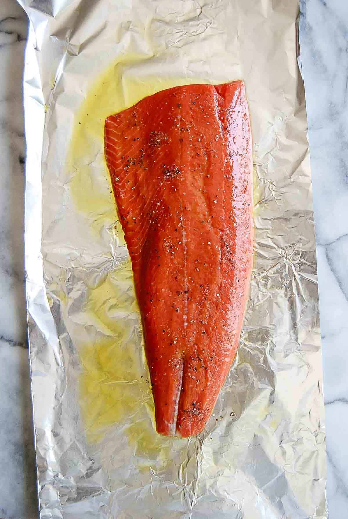 salmon on foil, rubbed with olive oil.