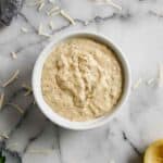 closeup of garlic parmesan sauce on countertop.