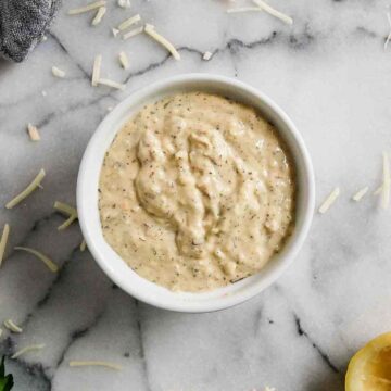 closeup of garlic parmesan sauce on countertop.