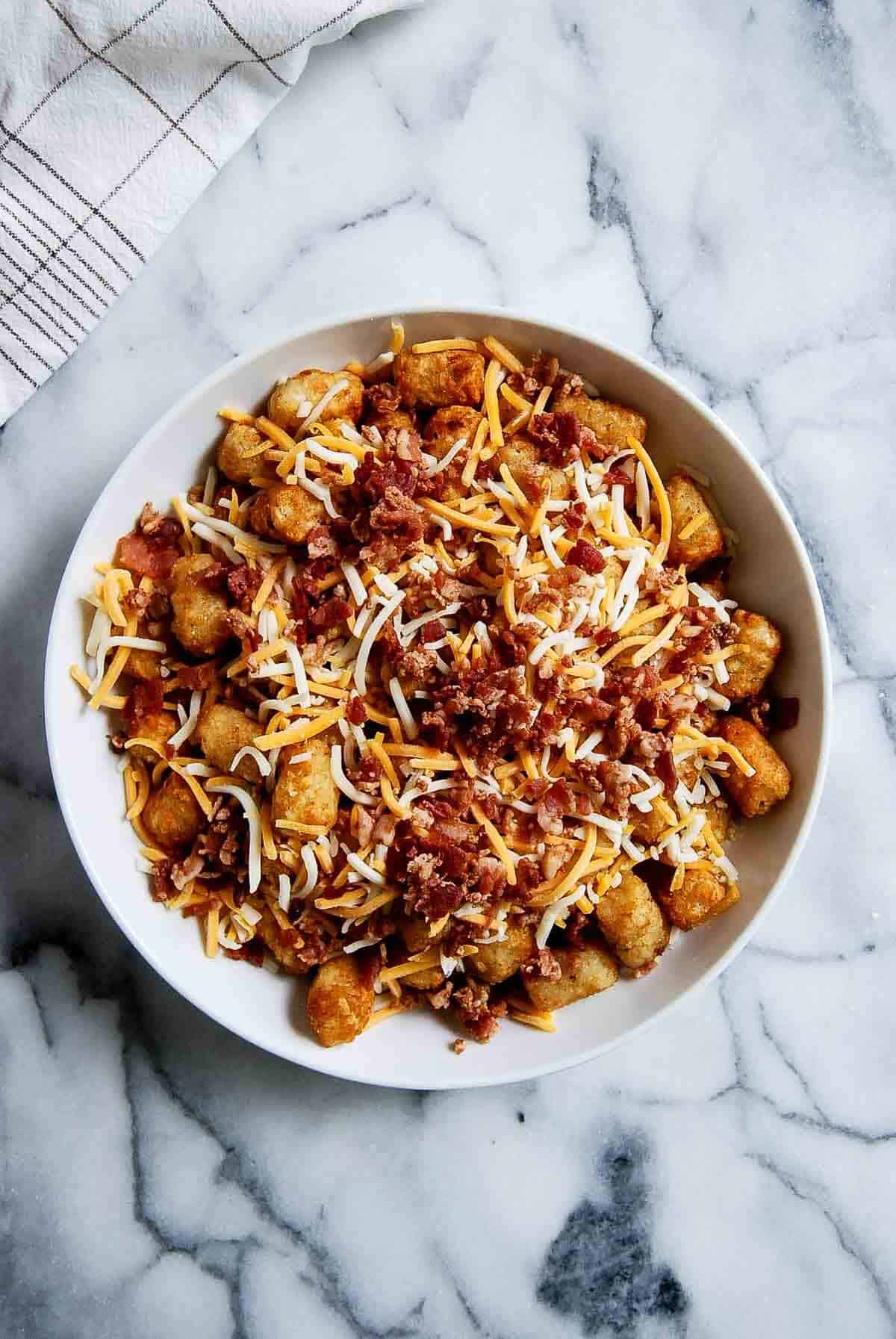 tater tots with cheese and bacon bits.