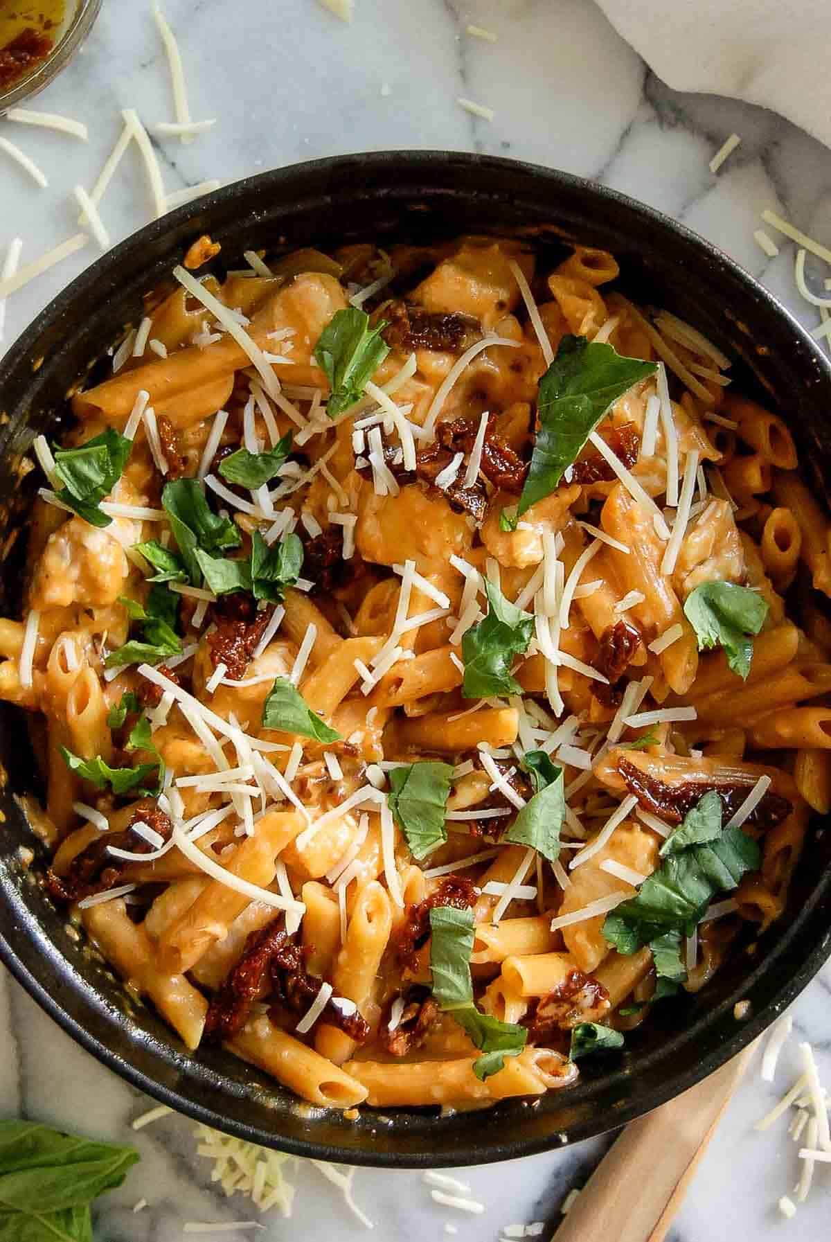 closeup of marry me chicken pasta in pot.