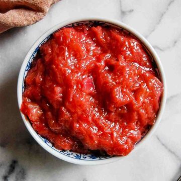 bowl of rhubarb sauce on countertop.