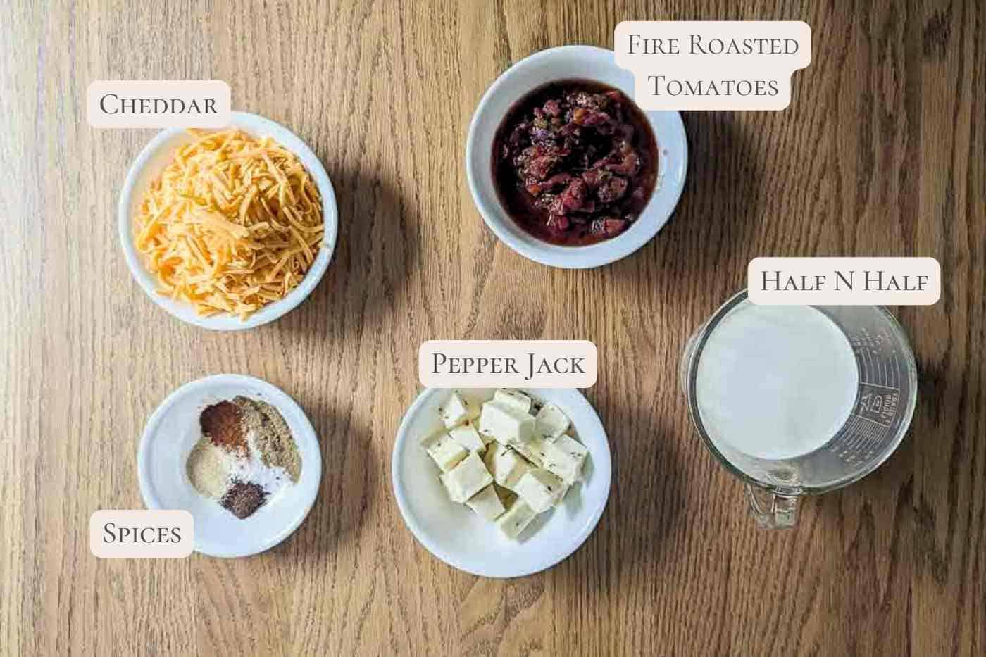 ingredients for smoked queso dip on table.