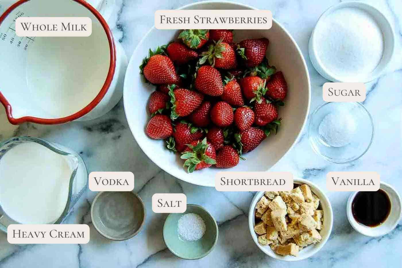 ingredients for strawberry shortcake ice cream on countertop, labeled.