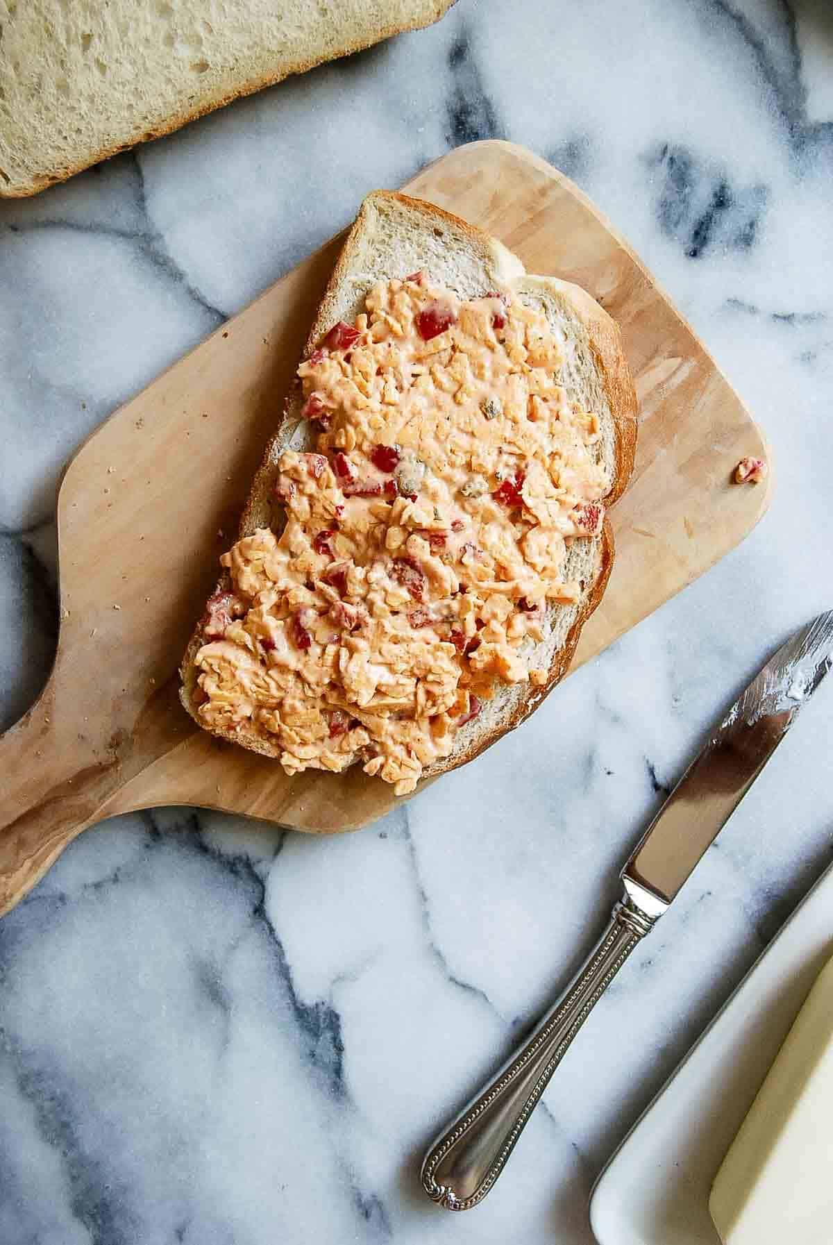 sourdough bread topped with pimento cheese.