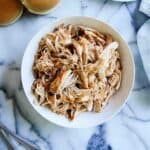 bowl of instant pot bbq chicken on countertop.