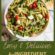 4-ingredient pesto pasta salad in bowl on countertop.