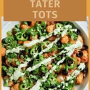 loaded tater tots (totchos) in bowl.
