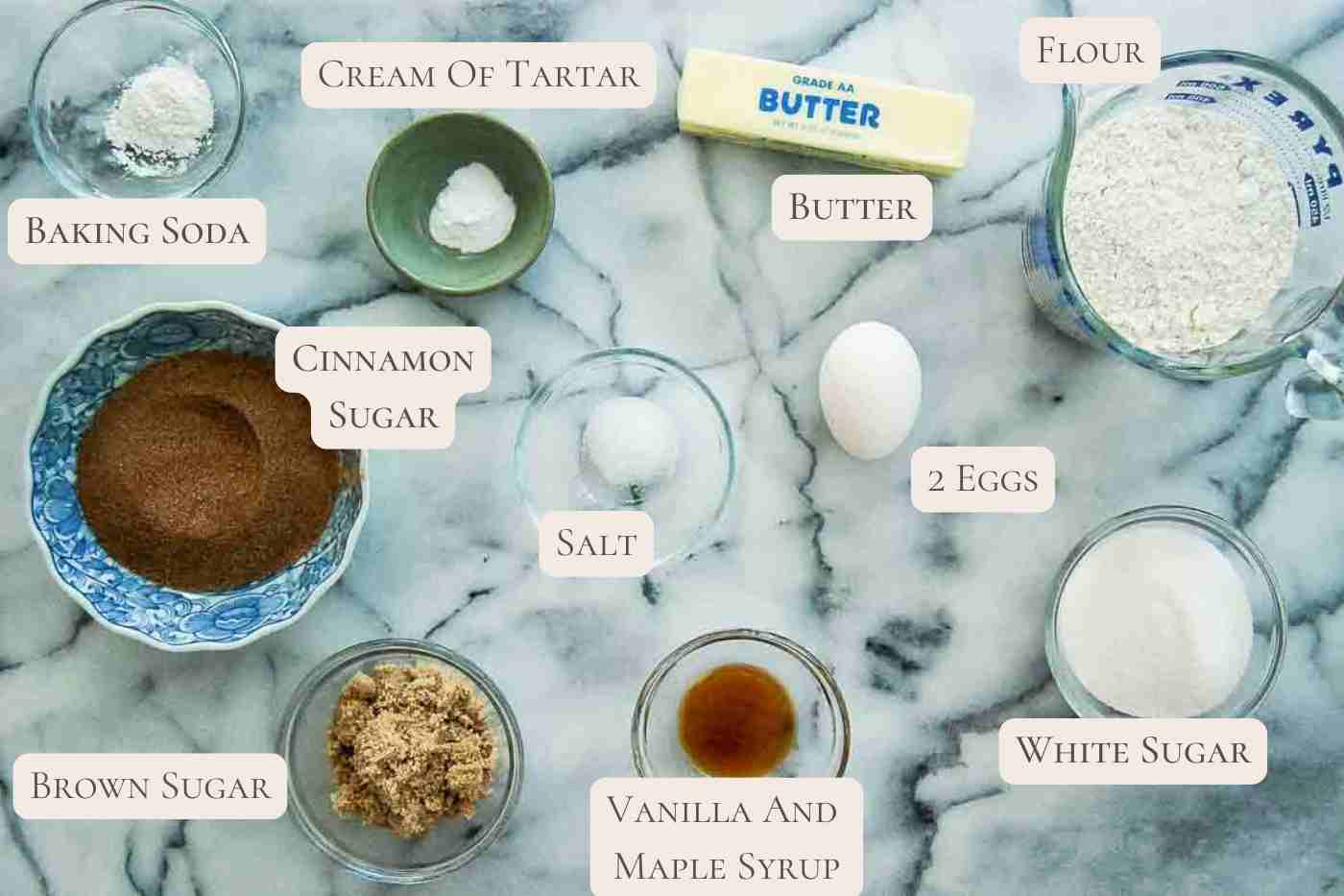 ingredients for brown butter snickerdoodles on countertop, labeled.