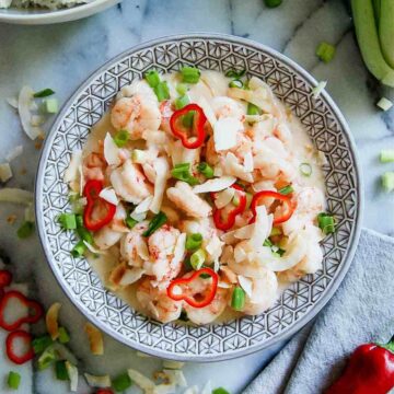 chinese coconut shrimp in bowl on countetop.