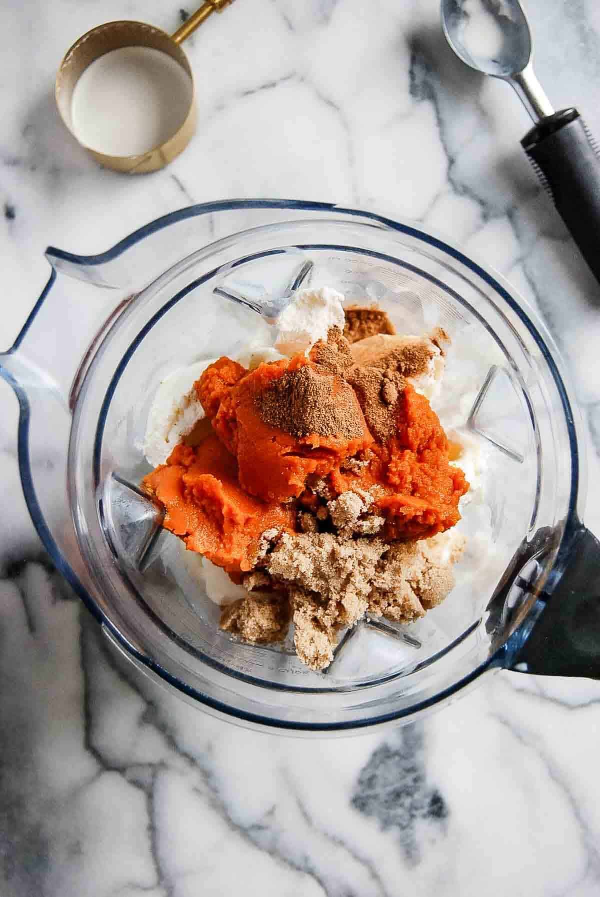 ice cream, cream, pumpkin puree, brown sugar and pumpkin spice in blender.