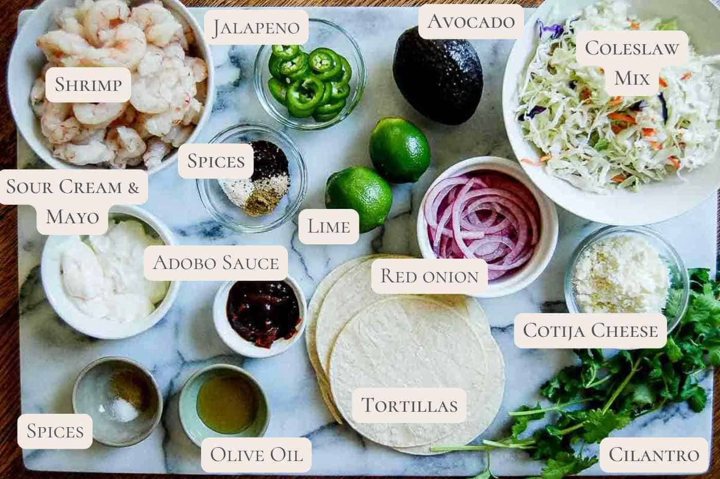 ingredients for baja shrimp tacos on countertop.