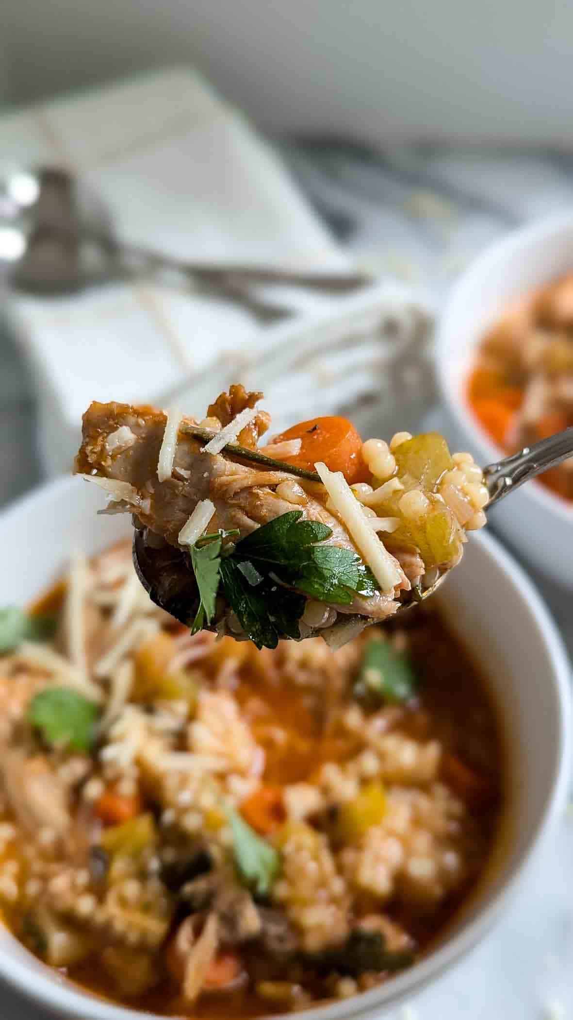 penicillian soup (pastina soup) on spoon.
