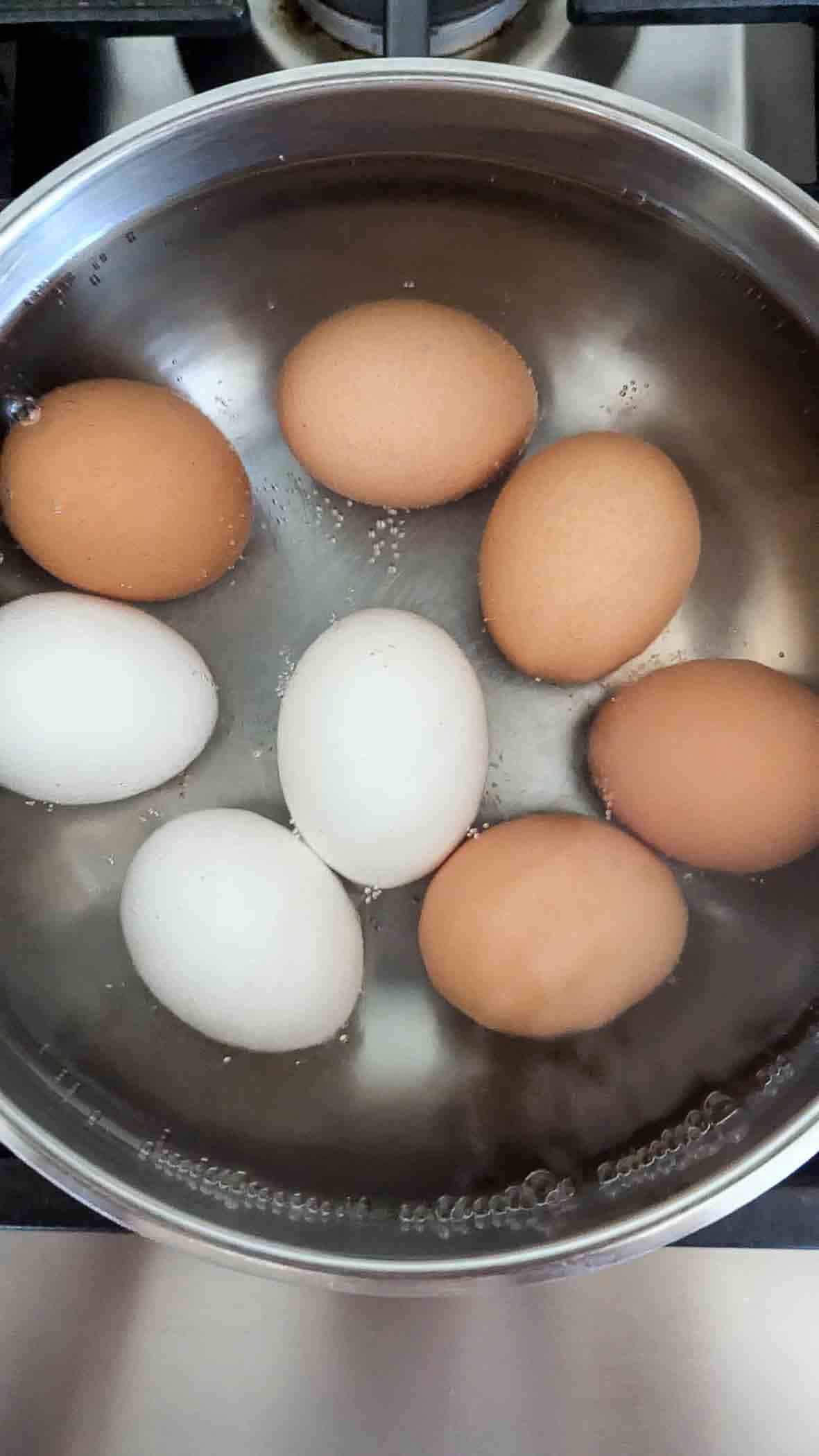 eggs boiling in water.