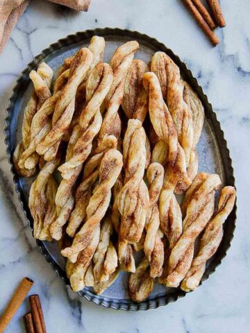 homemade cinnamon twists on tray.
