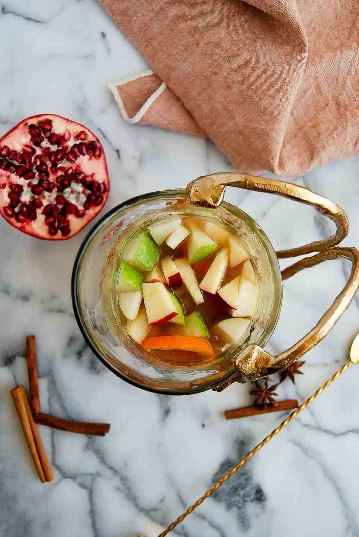 white wine apple cider sangria in pitcher.