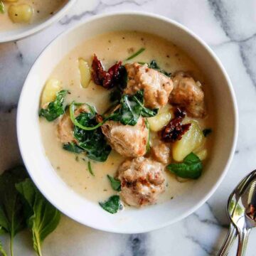 slow cooker tuscan chicken meatballs and gnocchi soup.