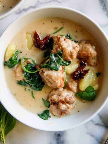 slow cooker tuscan chicken meatballs and gnocchi soup.