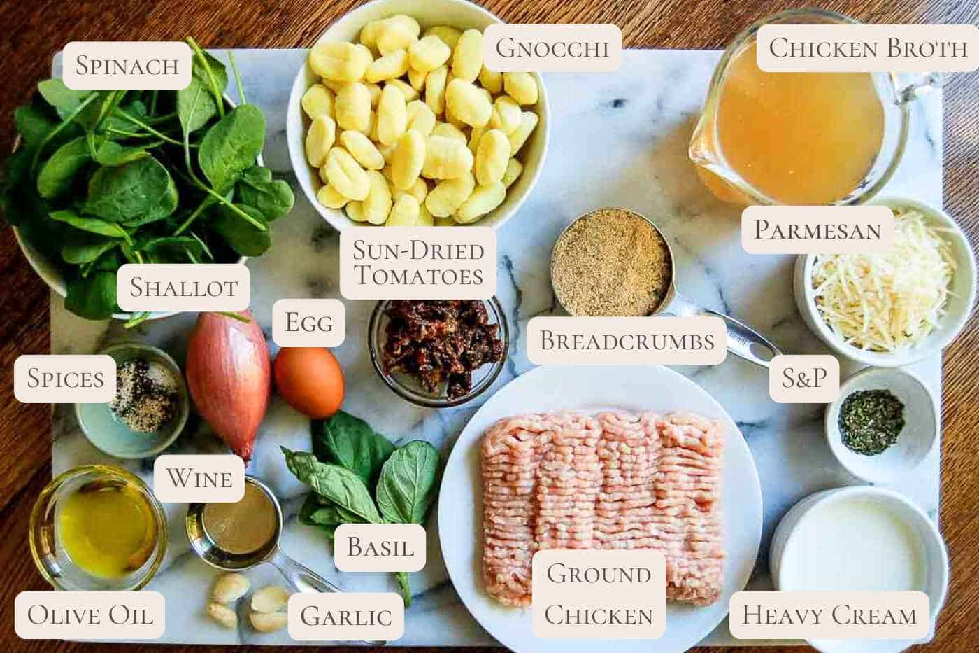 ingredients for slow cooker chicken meatballs with gnocchi, labeled.