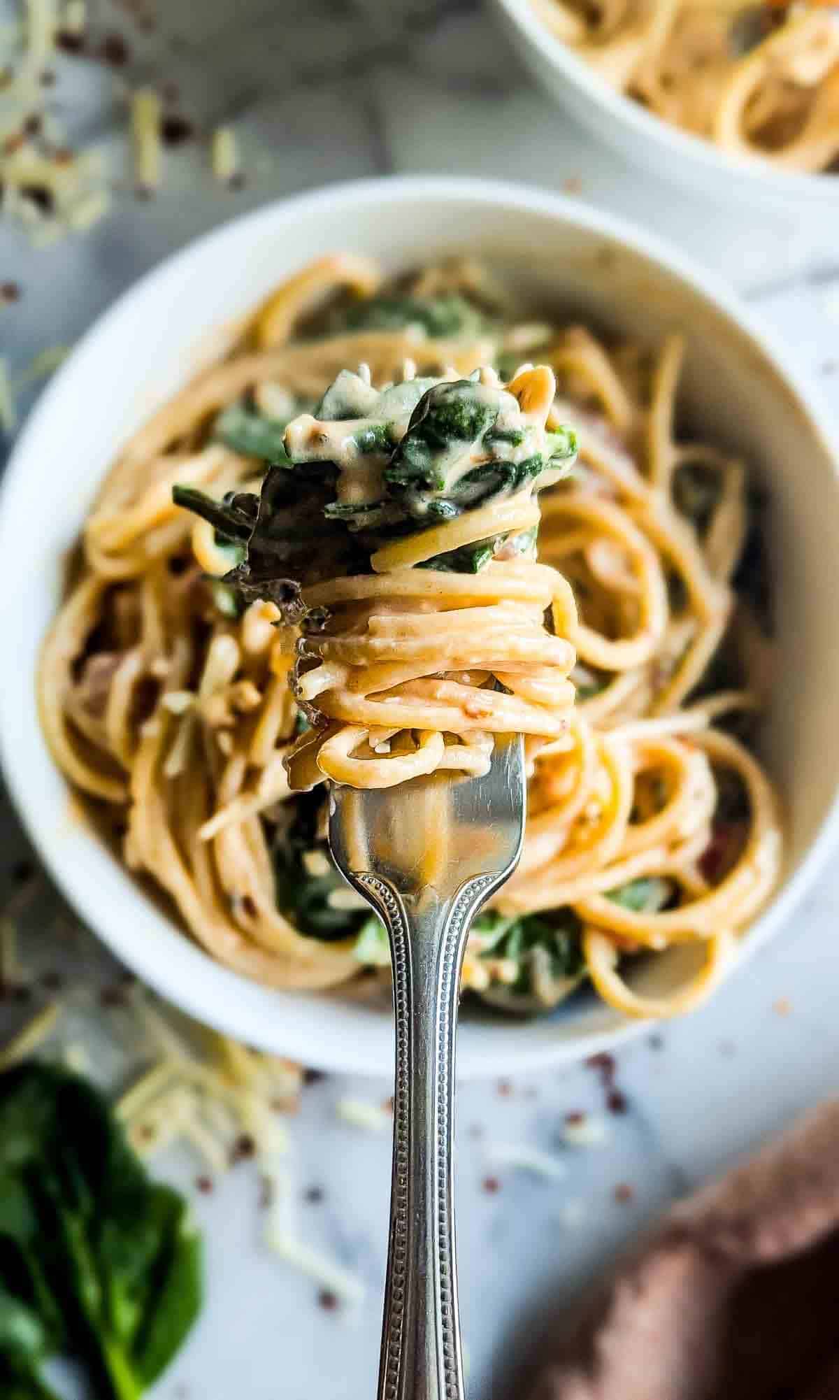 forkfull of crockpot chicken spaghetti.