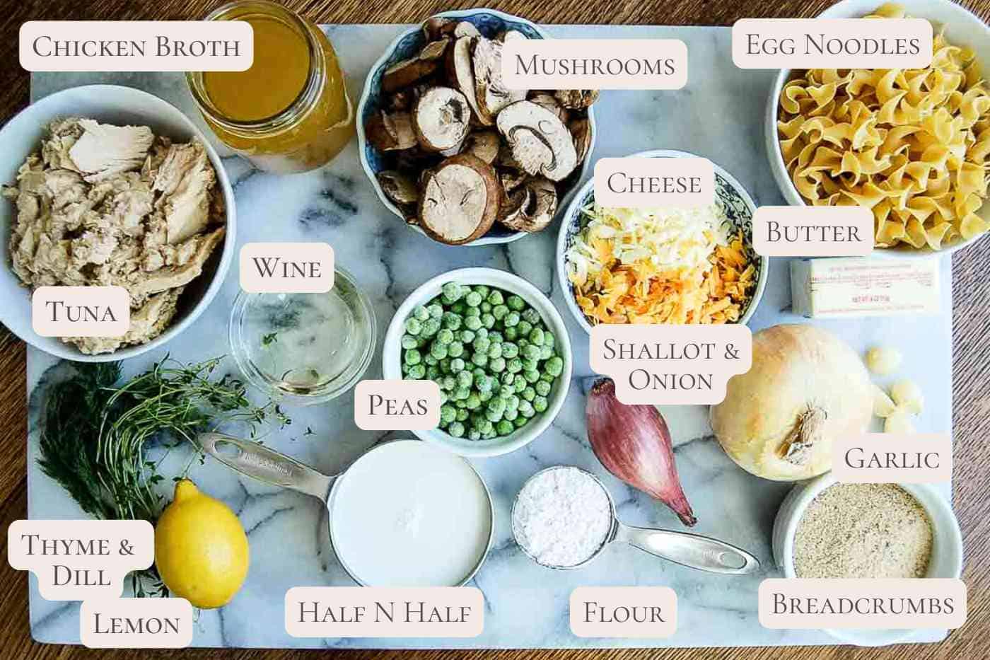 ingredients for tuna helper casserole on countertop, labeled.