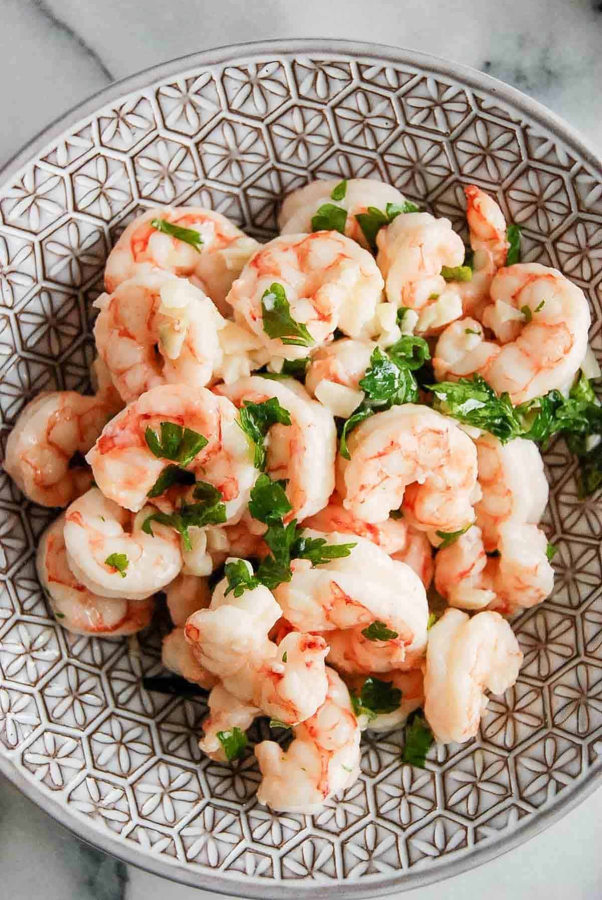 closeup of air fried frozen shrimp in bowl.
