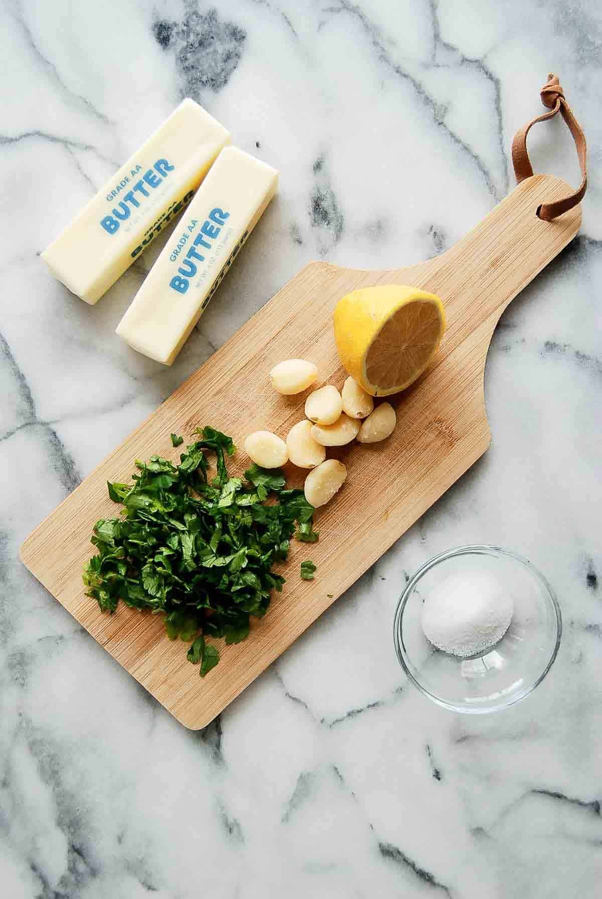 ingredients for garlic butter with parsley.