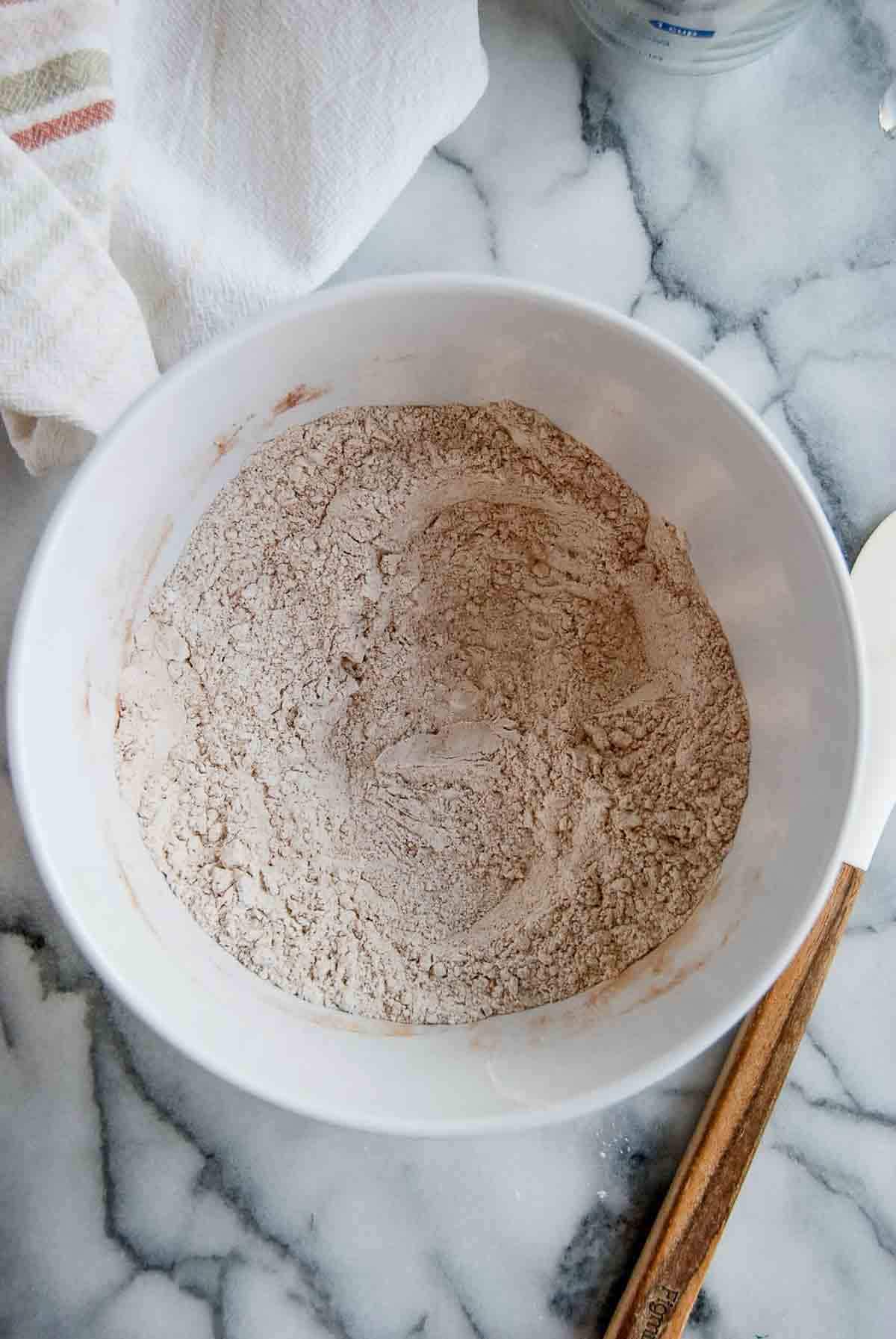 bowl of mixed dry ingredients for carrot cake cookies.