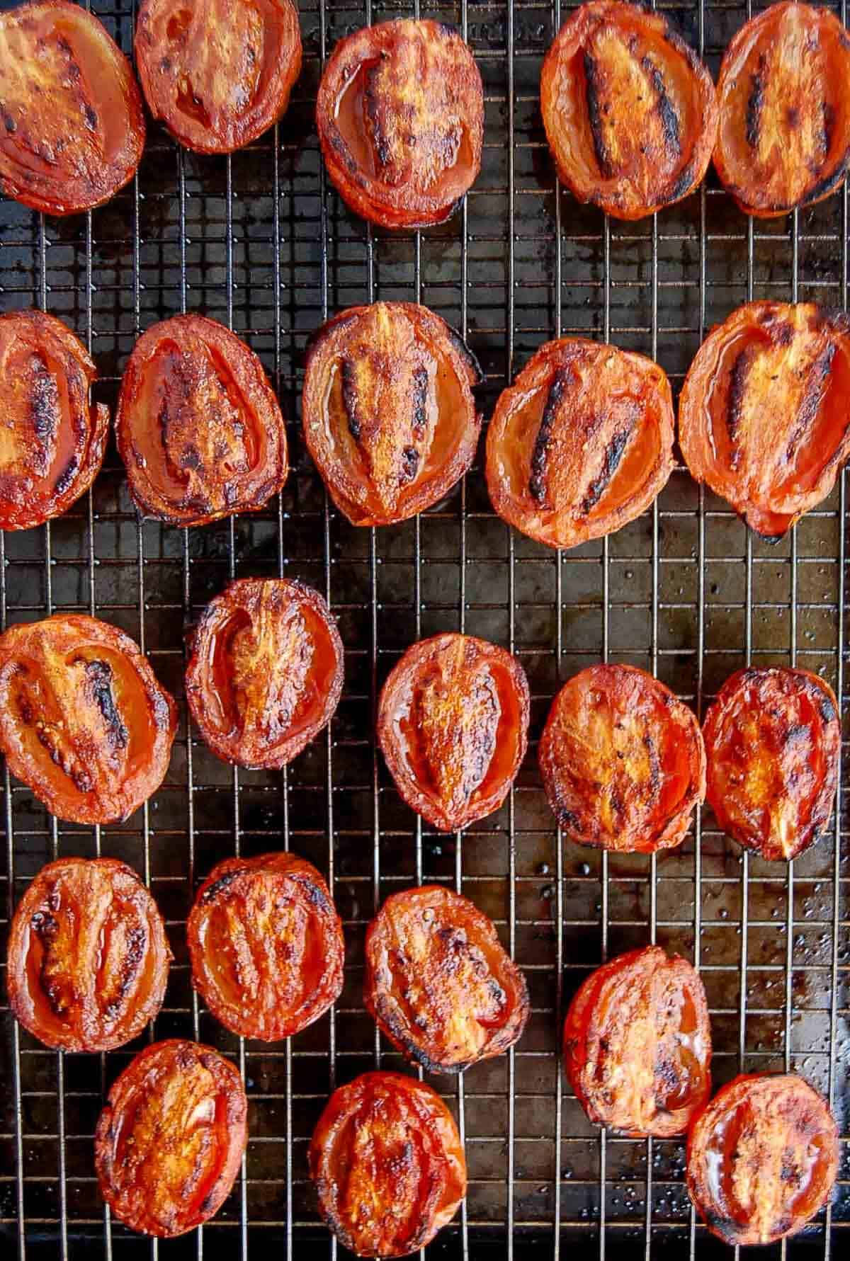 fire roasted tomatoes on baking sheet with wire rack.