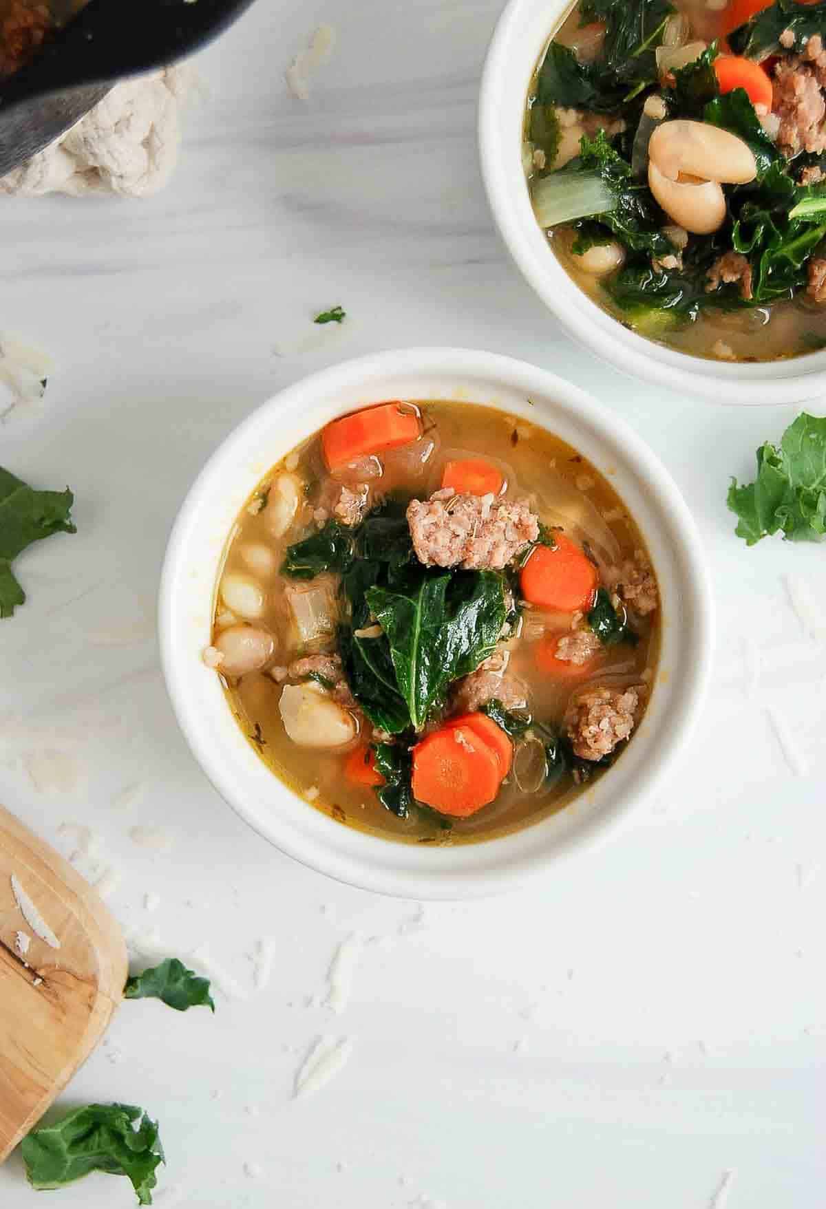 bowl of sausage kale and white bean soup.
