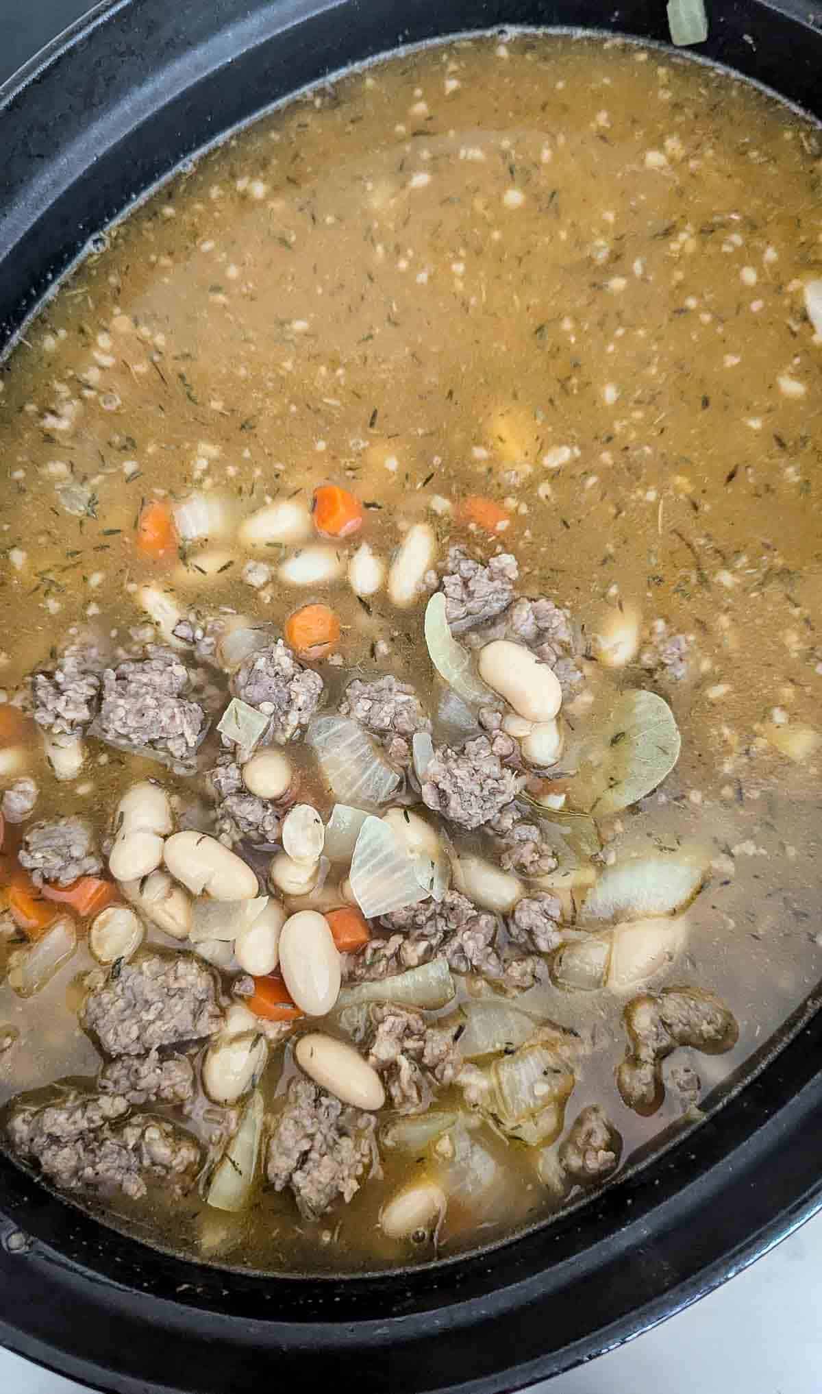 sausage and white beans with broth.