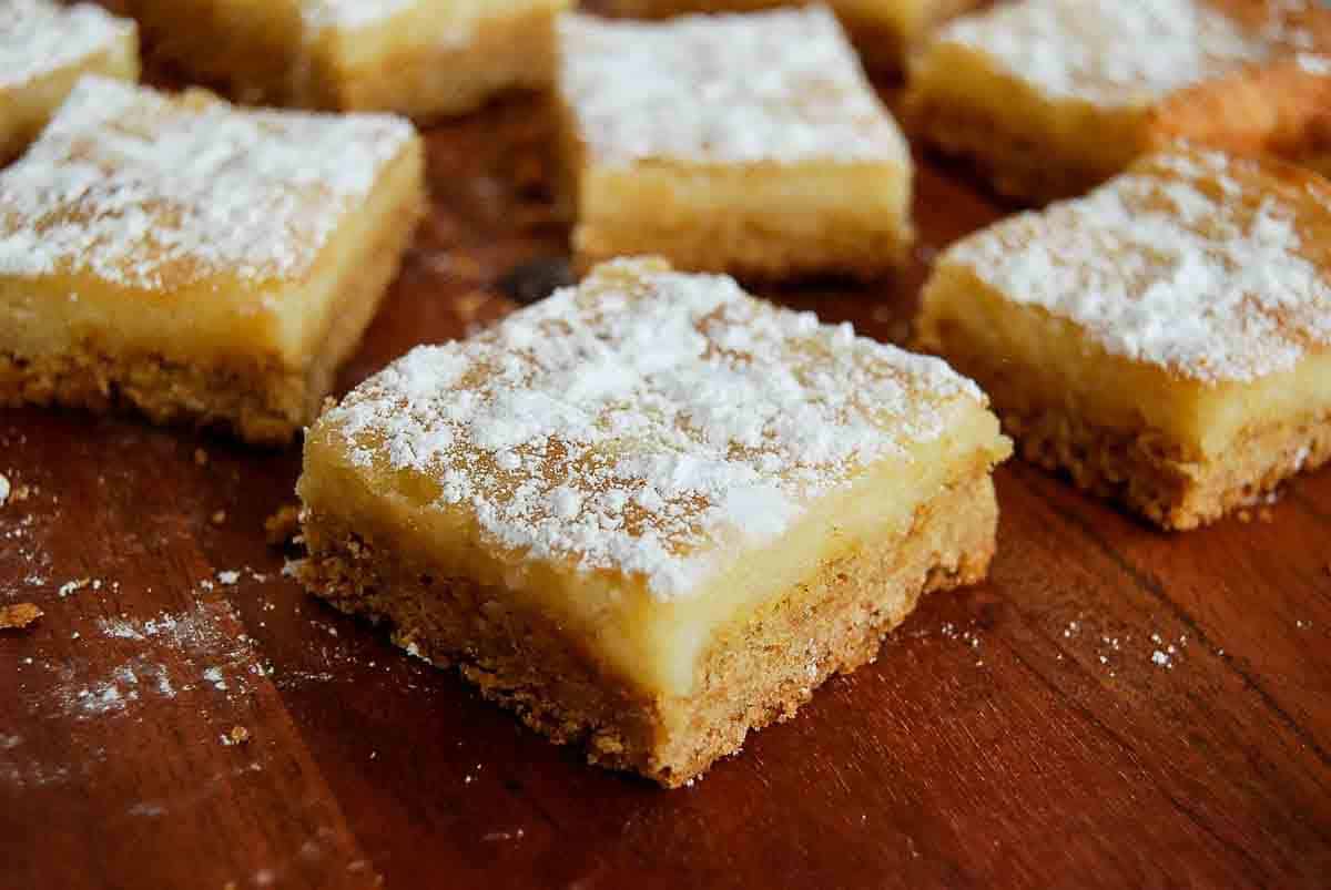 side view of brown butter bars on cutting board.